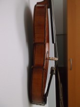 Delipped ¾ violin top off repairs 25