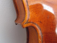 Delipped ¾ violin top off repairs 33