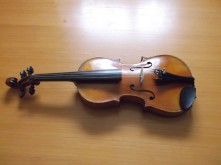 Delipped ¾ violin top off repairs 37