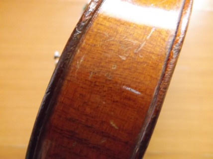 Delipped ¾ violin top off repairs 44
